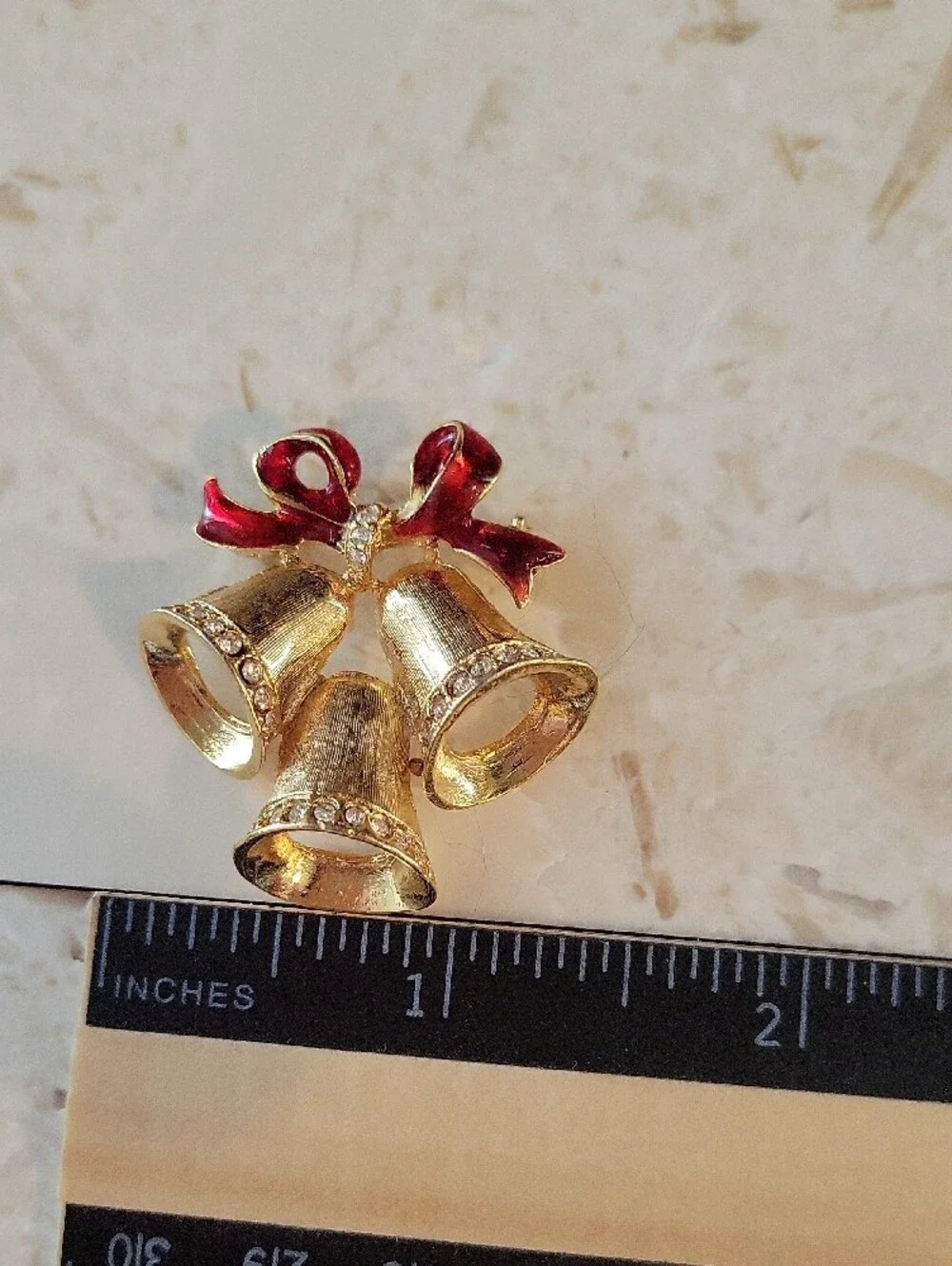 Gold-tone Holiday Bells Brooch with Red Enamel Bow